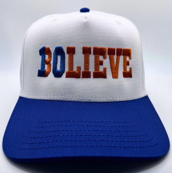 White cap with blue brim and 'BOLIEVE' text in orange and blue on a white background