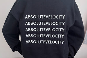 A black crewneck embroidered with a company name repeated five times across the back.
