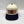 DEN embroidered in orange, burgundy and gold block letters on a natural 5-panel snapback with a navy brim, by Threaded by Sal